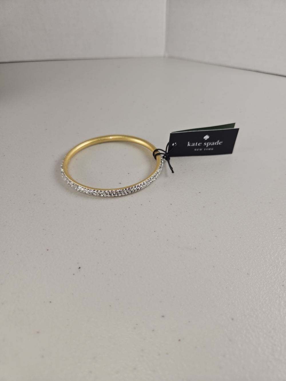 NWT kate spade gold and clear crystal pavé bangle bracelet